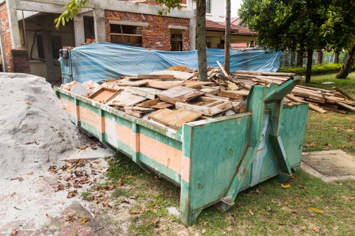 Professional waste clearance team at work in Leatherhead